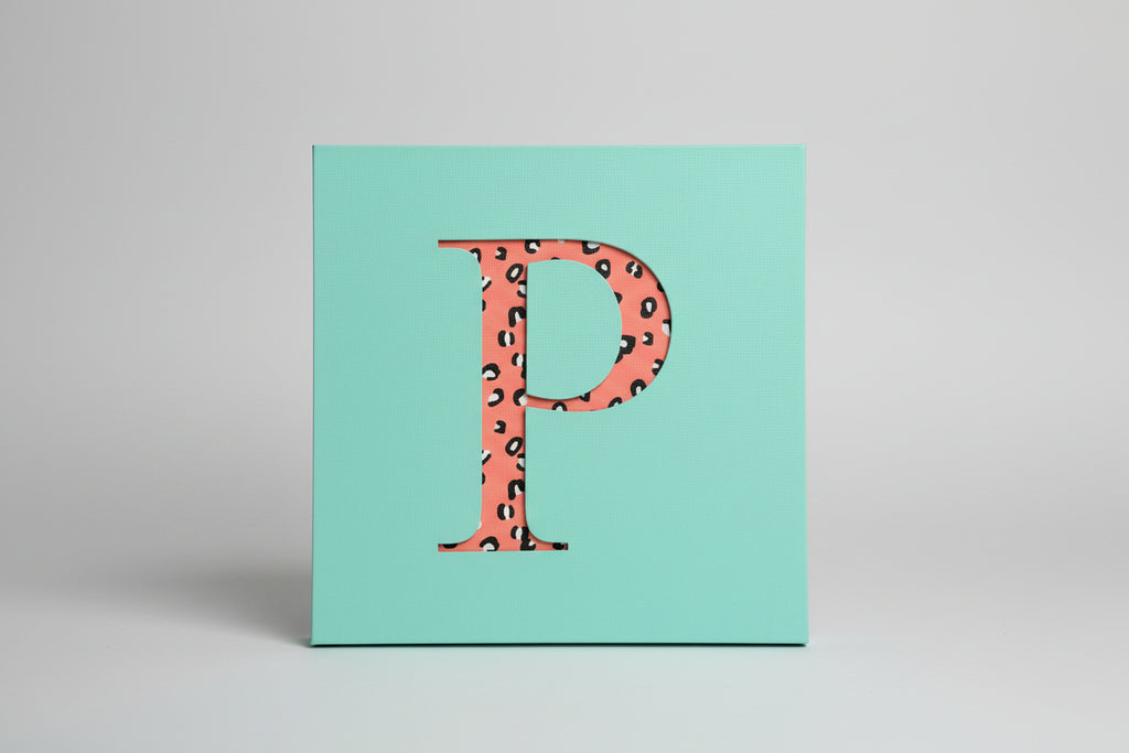 Wooden initial wall art with fabric