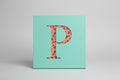 Wooden initial wall art with fabric