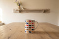 Bright cow pattern mug and coaster